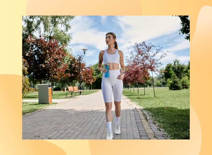 Woman walking outdoors in a park for exercise