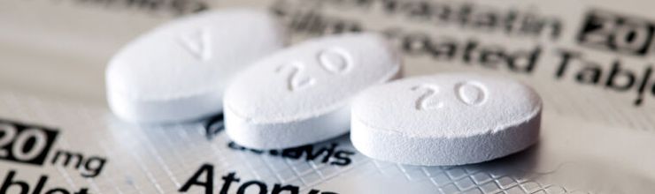 Atorvastatin 20 mg tablets on prescription medication packaging